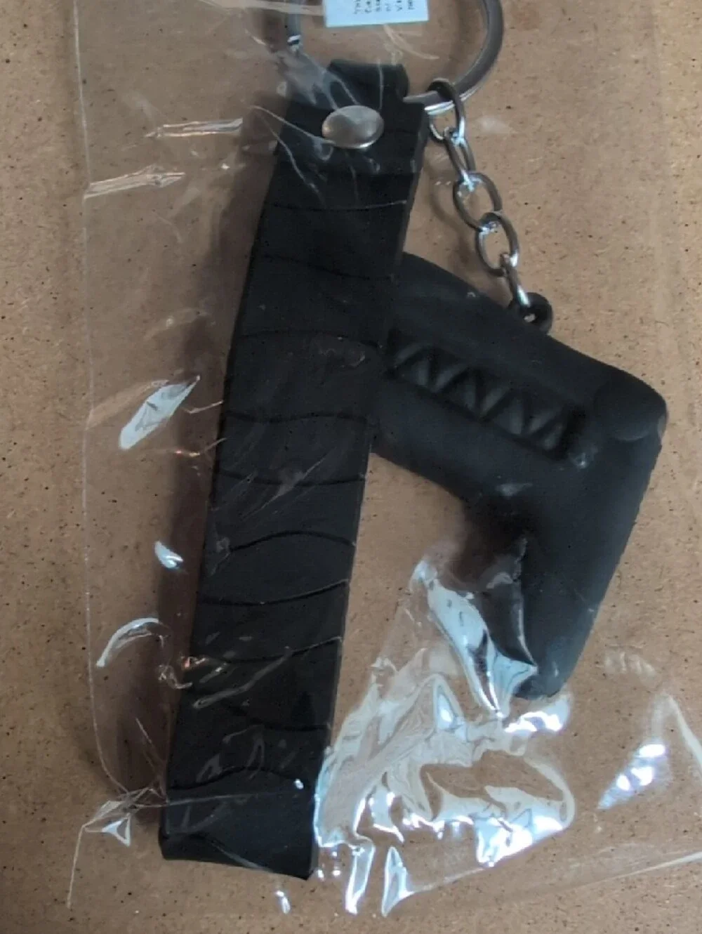 Black Roller Skate Keychain with Rainbow Star Accent